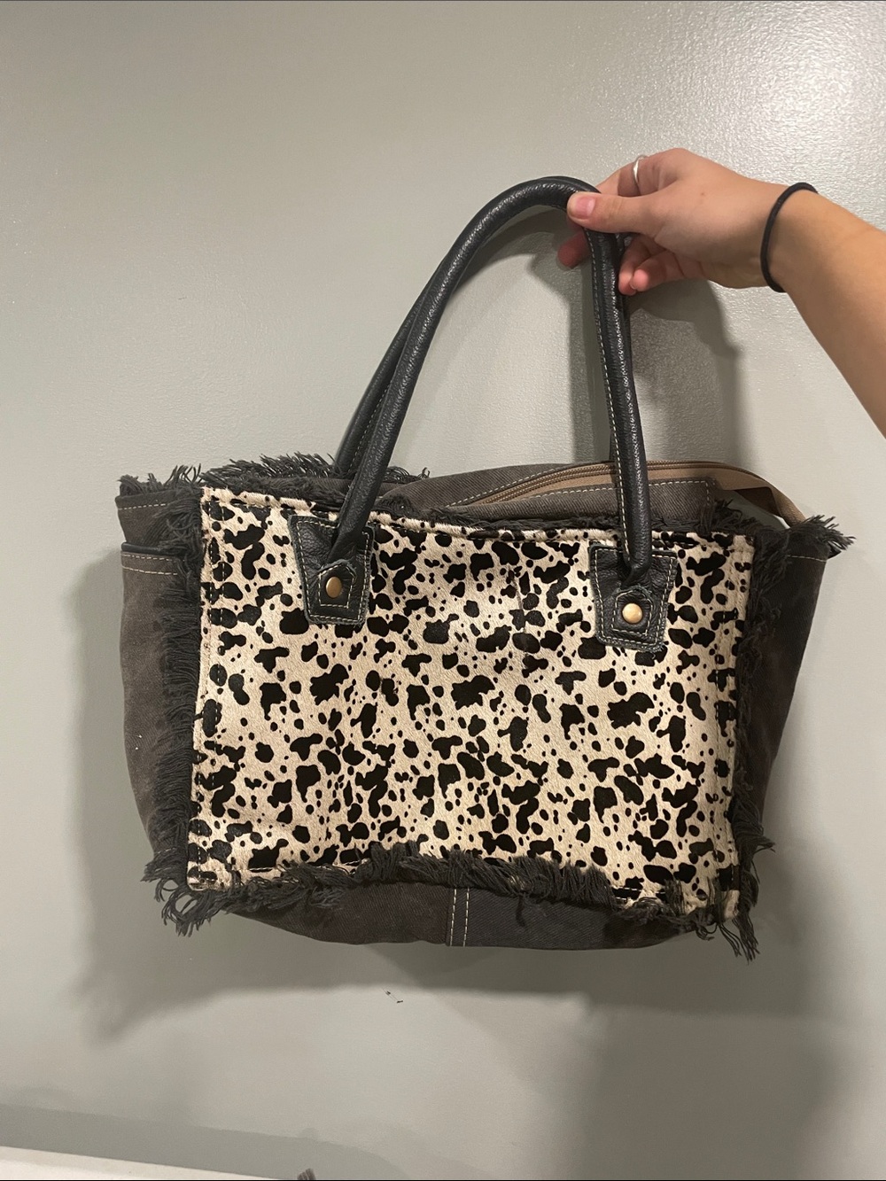 Cowhide Spot Fringe Tote Bag in Black and Cream
